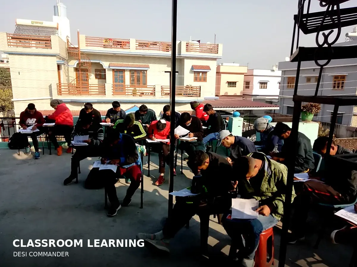 Students writing a mock test on the rooftop classroom